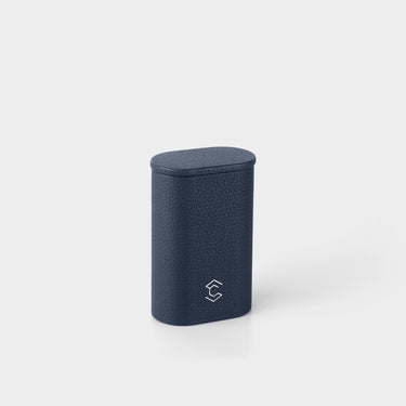 Product photo of standing Oscar 1 Watch roll in marine Taurillon leather. Designed to hold 1 watch.