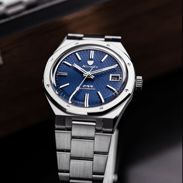 F77 Blue With Date - Nivada Grenchen